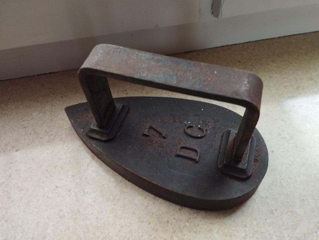 Brocante gietijzeren strijkijzer, Enlèvement