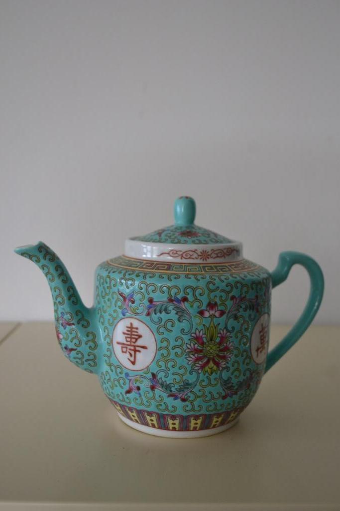 Theepot met Chinees motief, Ophalen