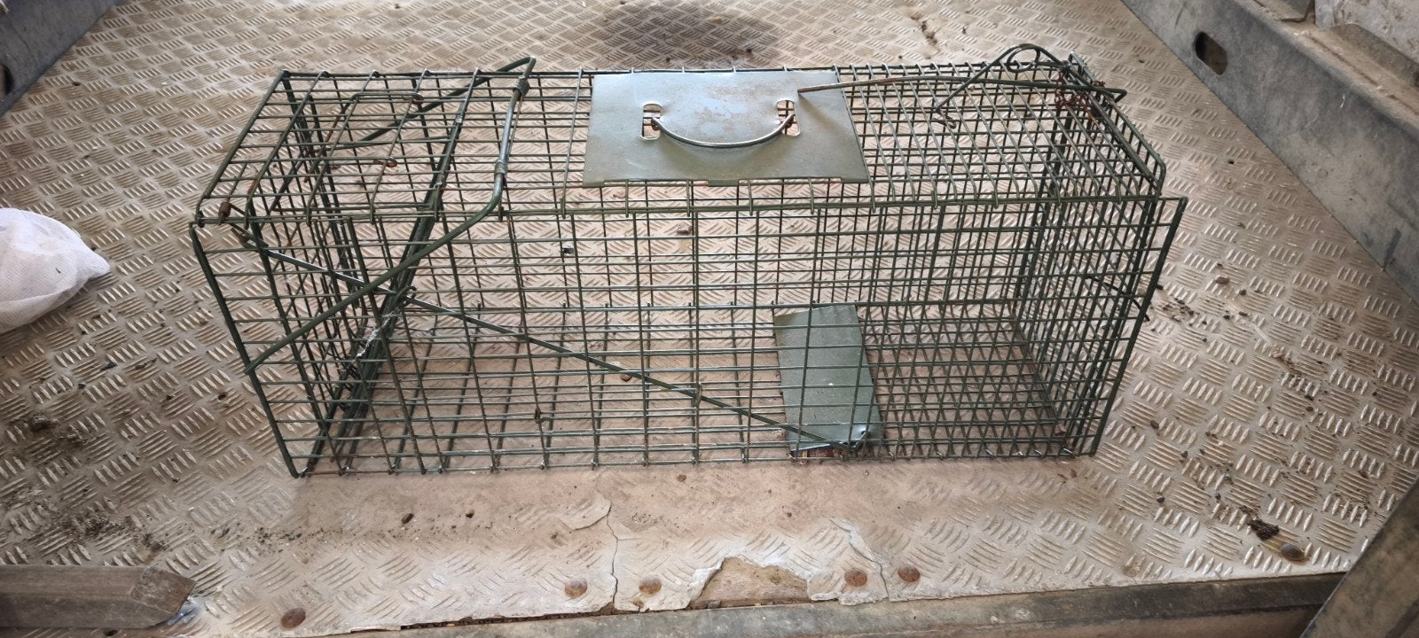 dieren val kooi, Ophalen