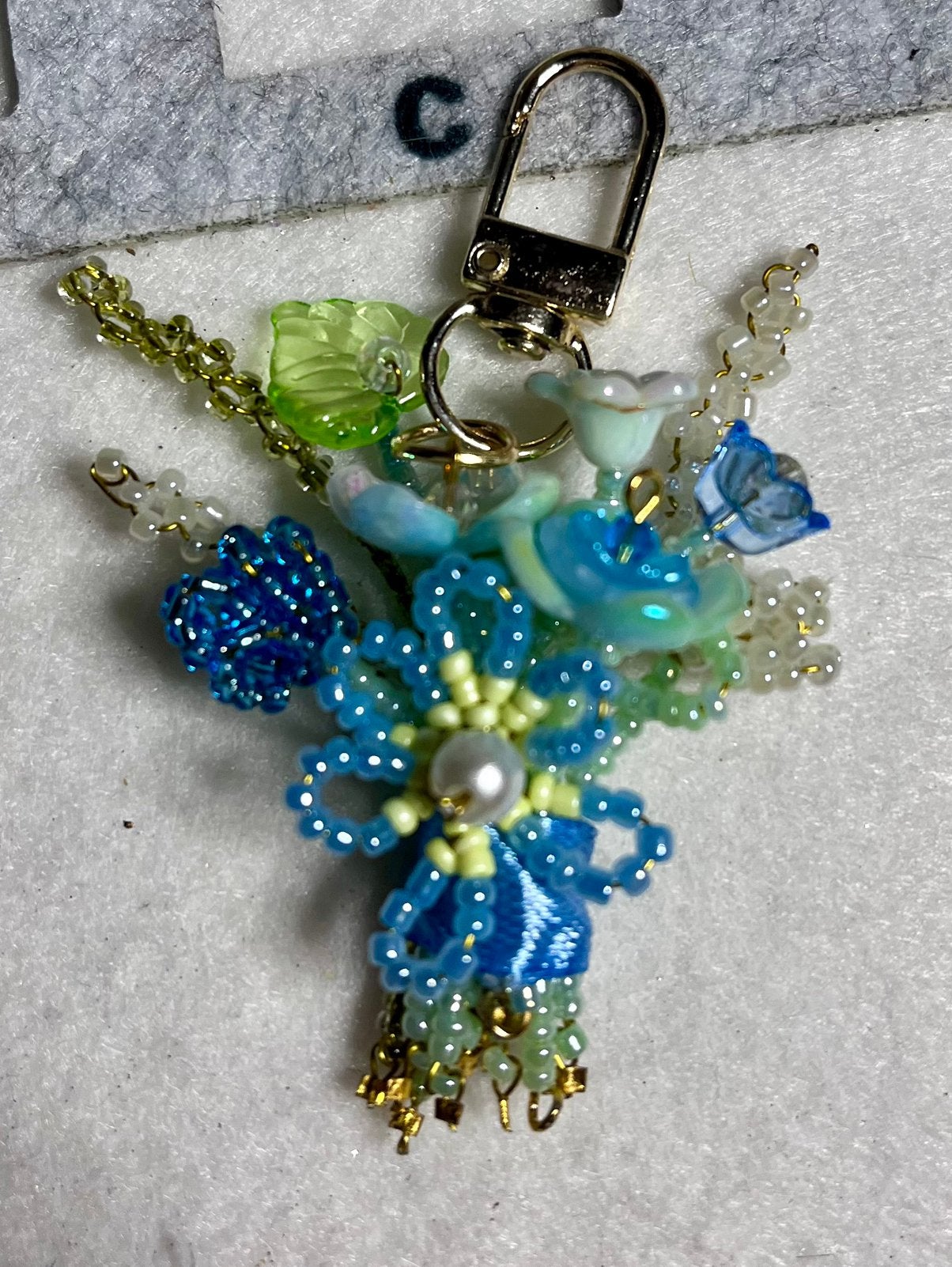 Porte-clé bijoux pour sac bouquet de fleurs, Enlèvement ou Envoi, Comme neuf, Bleu