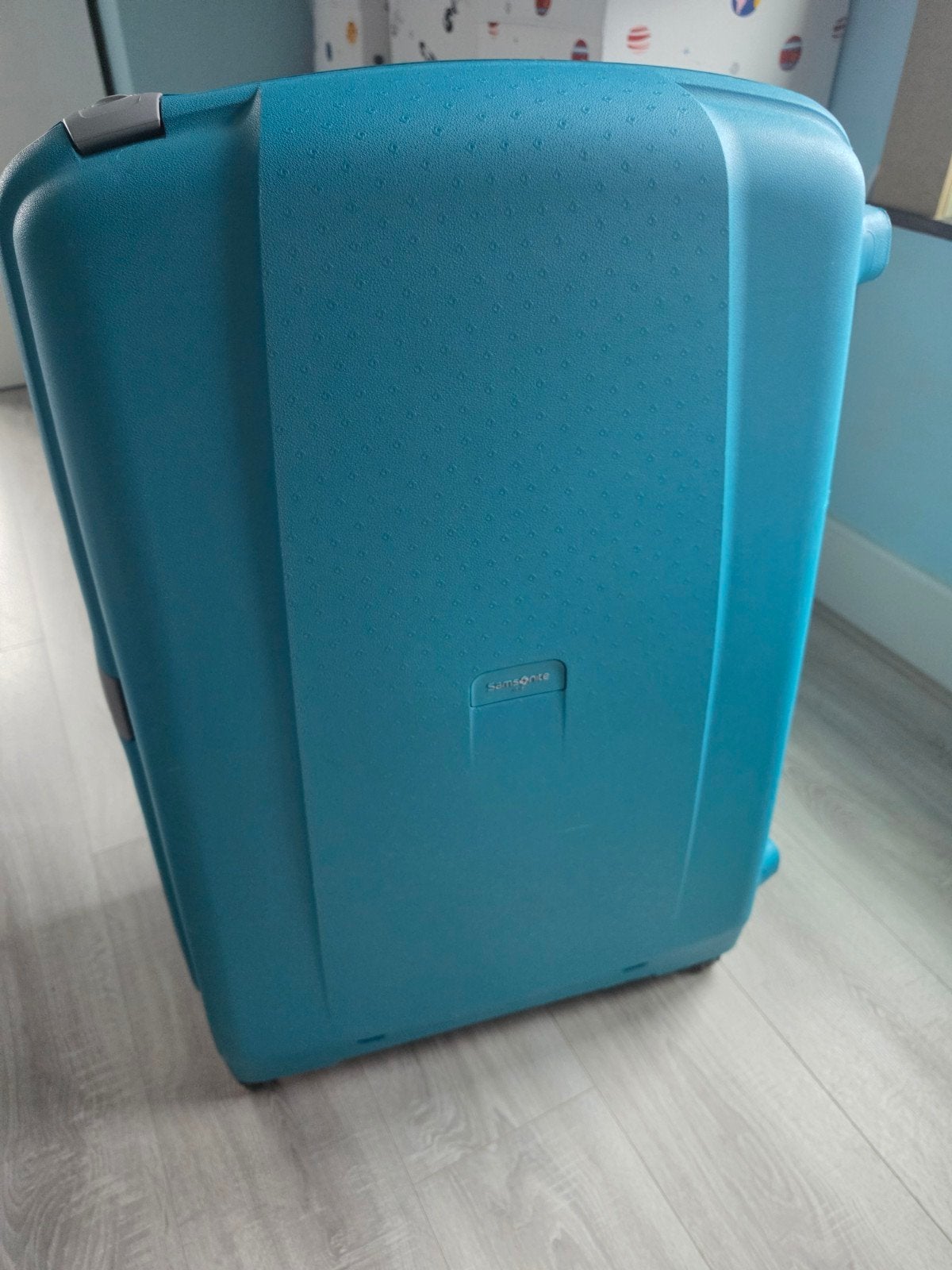 Grote samsonite koffer, Ophalen