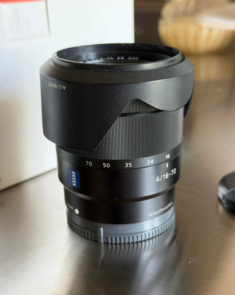 Sony Zeiss 16-70 mm f/4 comme neuf, Enlèvement ou Envoi, Comme neuf