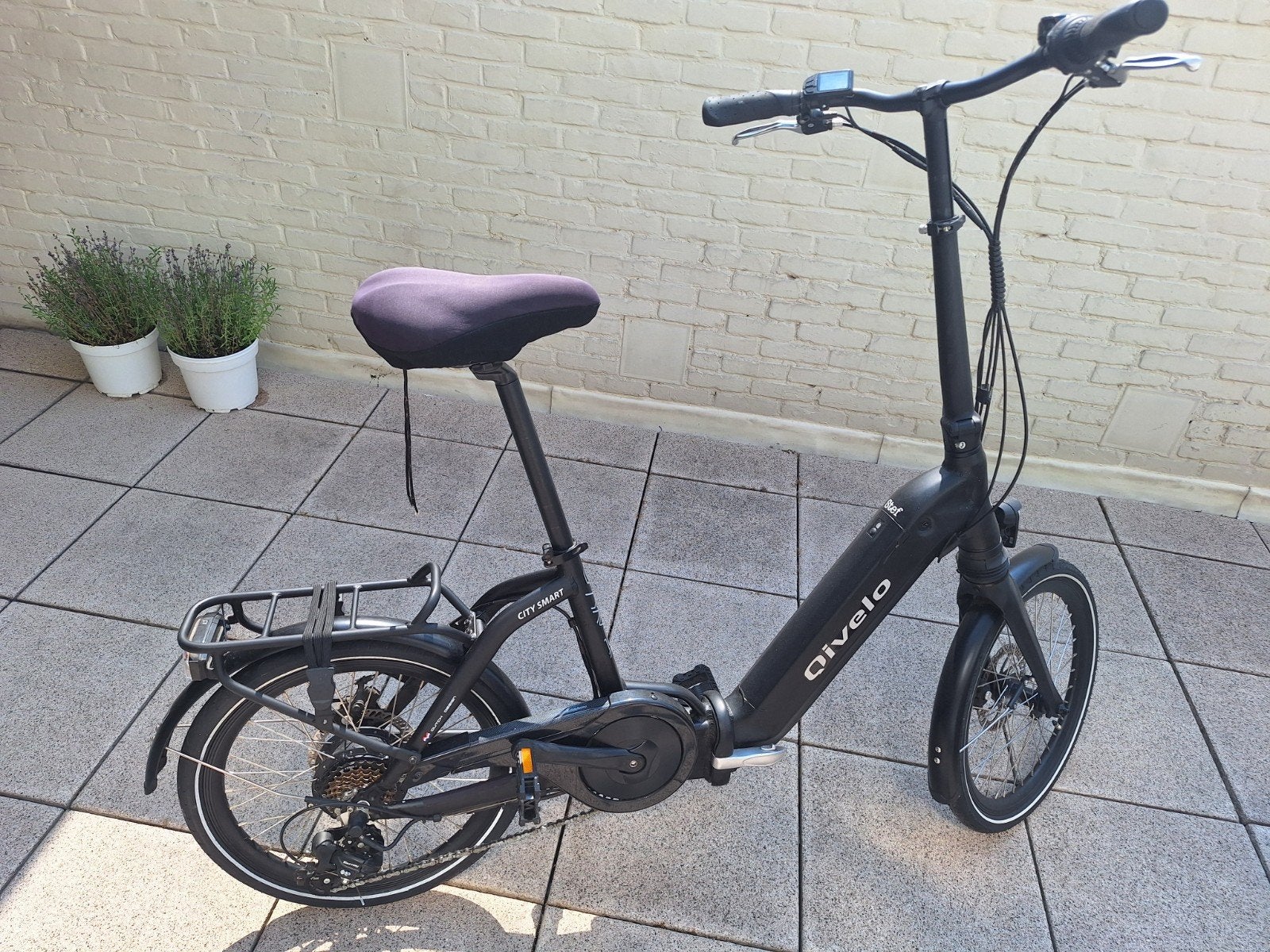Plooifiets quivelo zwart, Ophalen