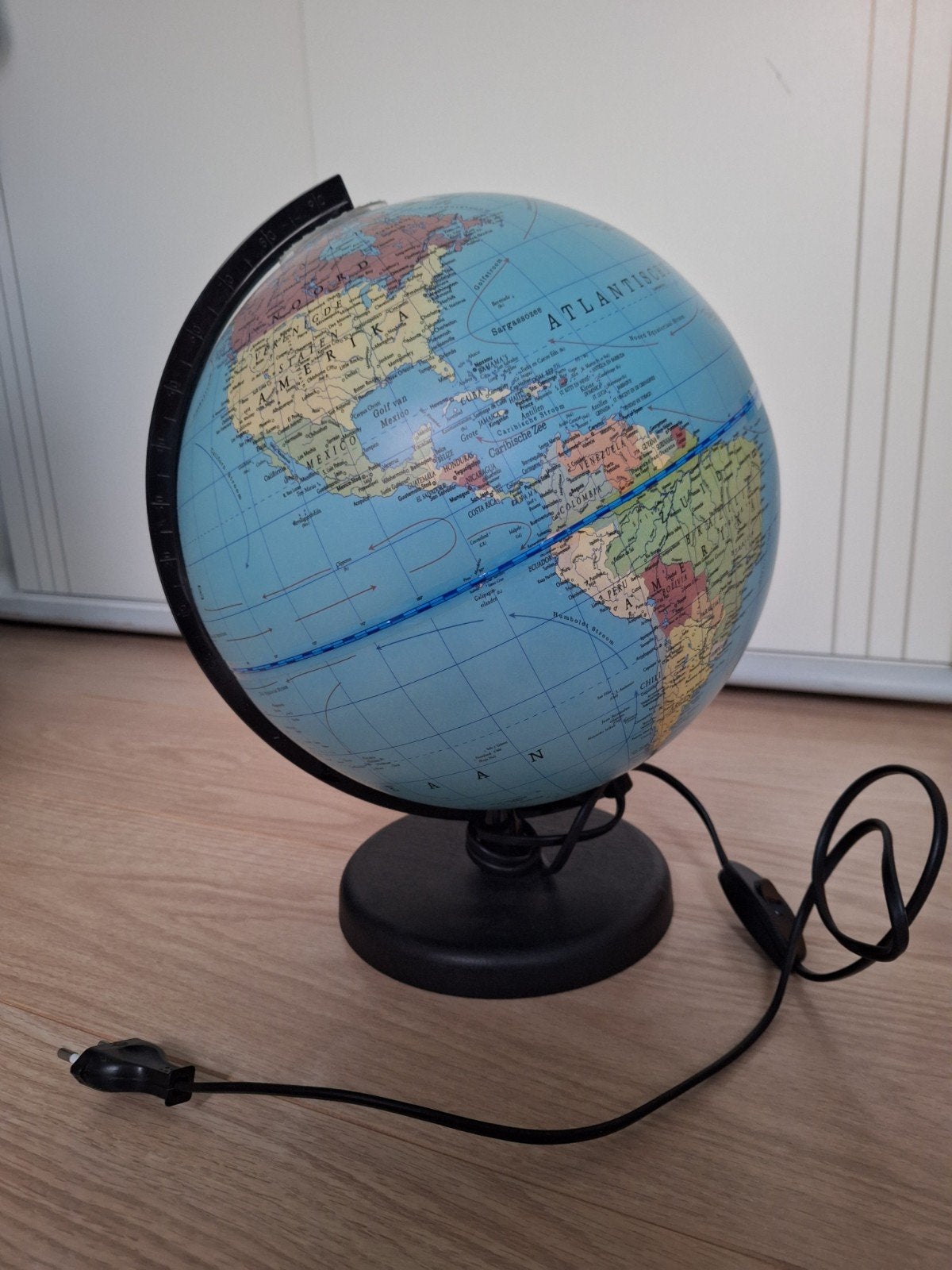 Verlichte wereldbol, Ophalen, Zo goed als nieuw