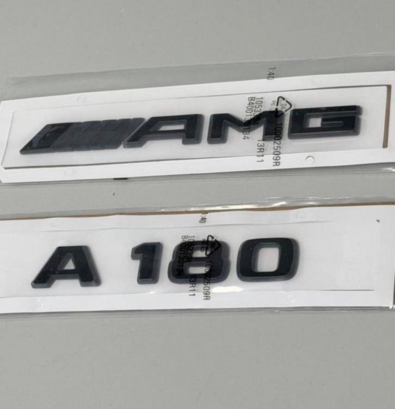 Glans zwart emblemen - Mercedes A Class W176  W177 A180 AMG, Ophalen of Verzenden
