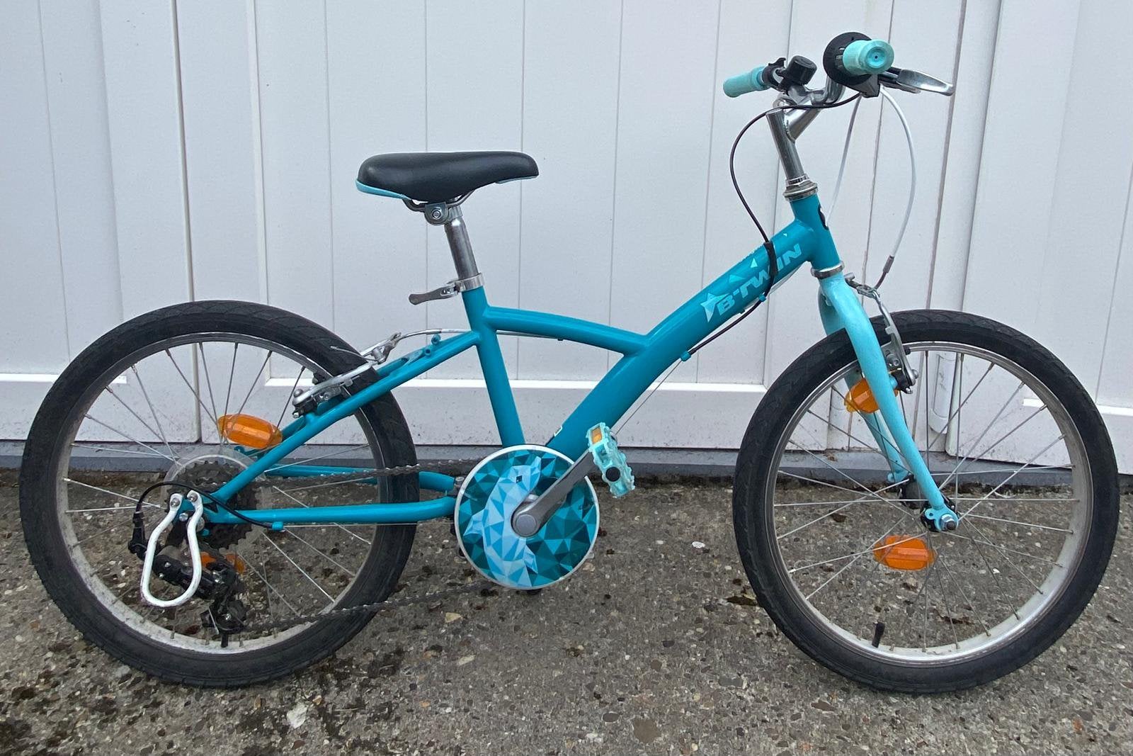 Btwin turquoise 20 inch kinderfiets, Ophalen, Gebruikt, Velgrem, 20 inch of meer