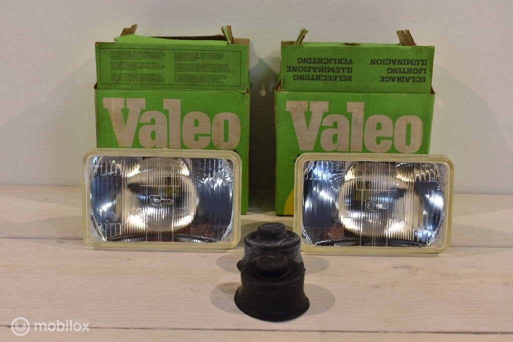 NOS Set Cibié koplampen Nissan Mitsubishi Mazda 929 Toyota, Mitsubishi, Nieuw, Ophalen of Verzenden, Mitsubishi