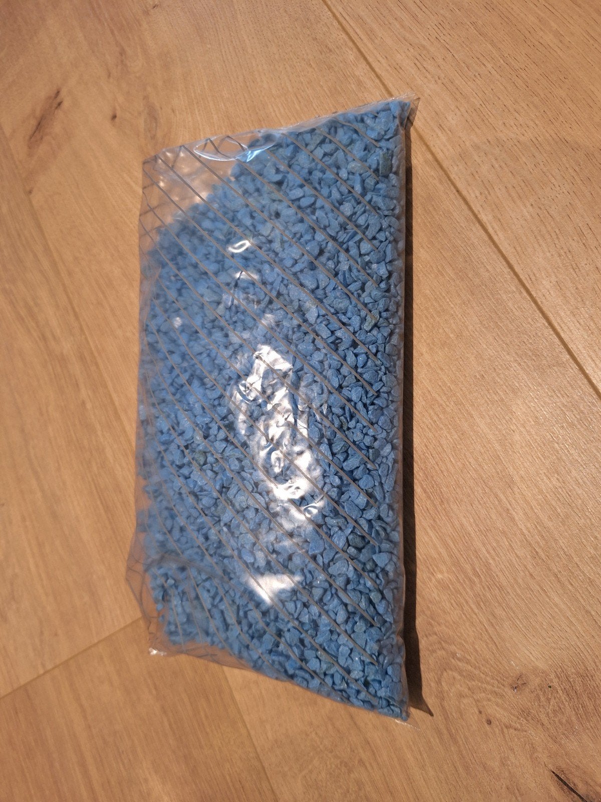 Gratis zaakje blauw gri.d voor aquarium.