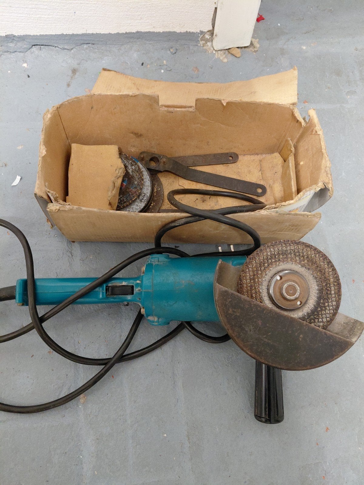 makita slijpmachine, Ophalen