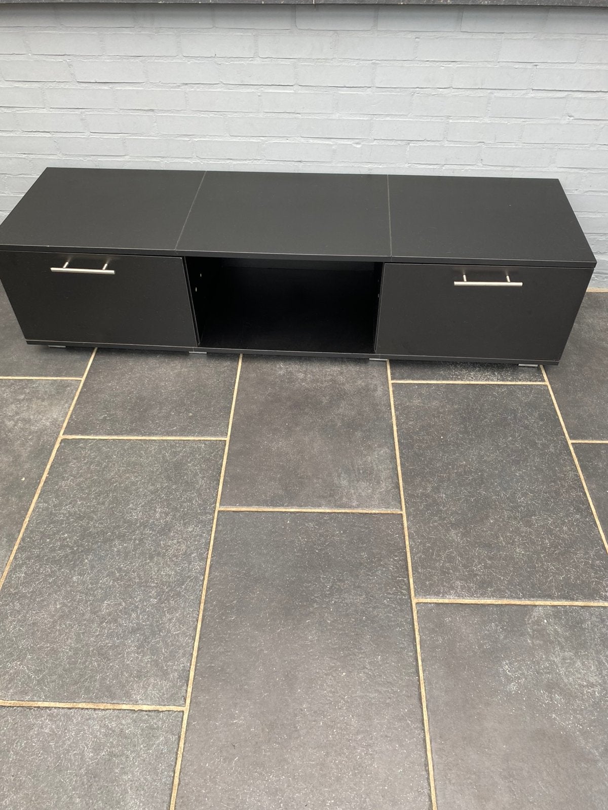 Laag tv meubel, Ophalen