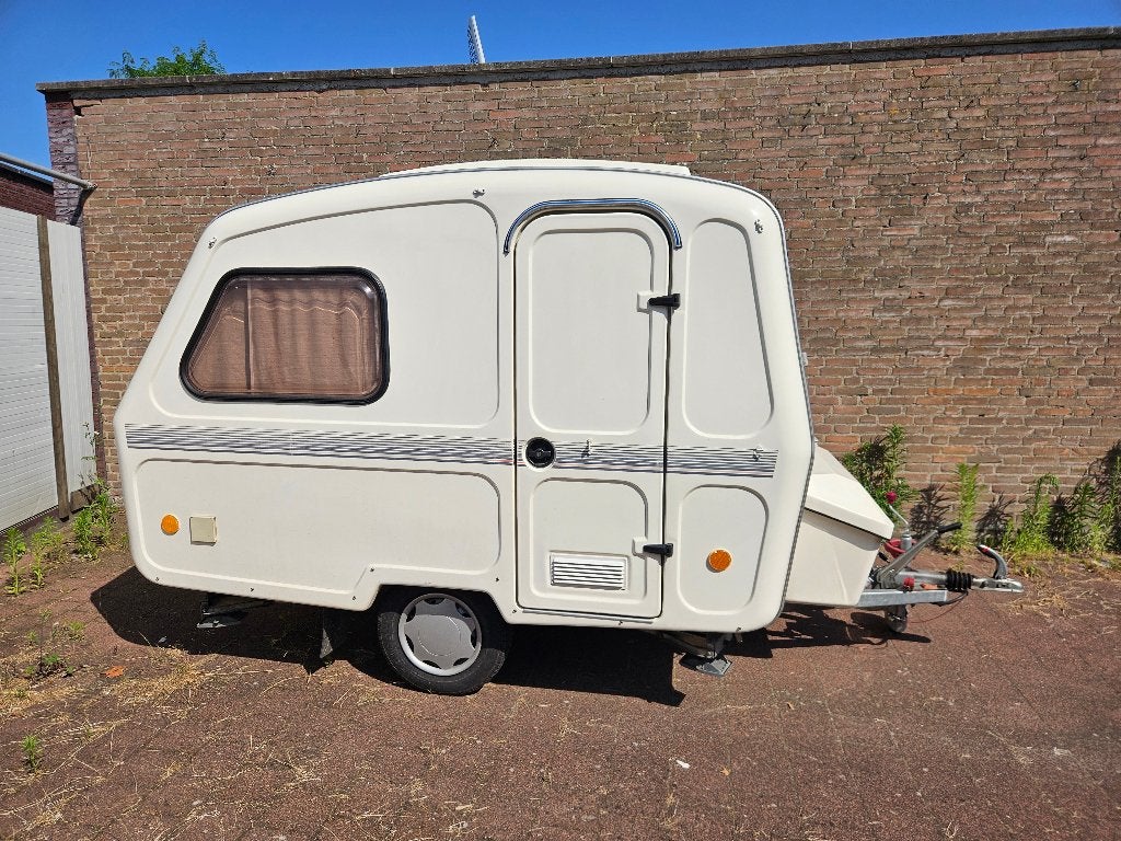 Predom caravan  uit 2004 tot 750 kg met mooie voortent, Caravans en Kamperen, Caravans, Vast bed, Tot en met 2, Luifel, Predom