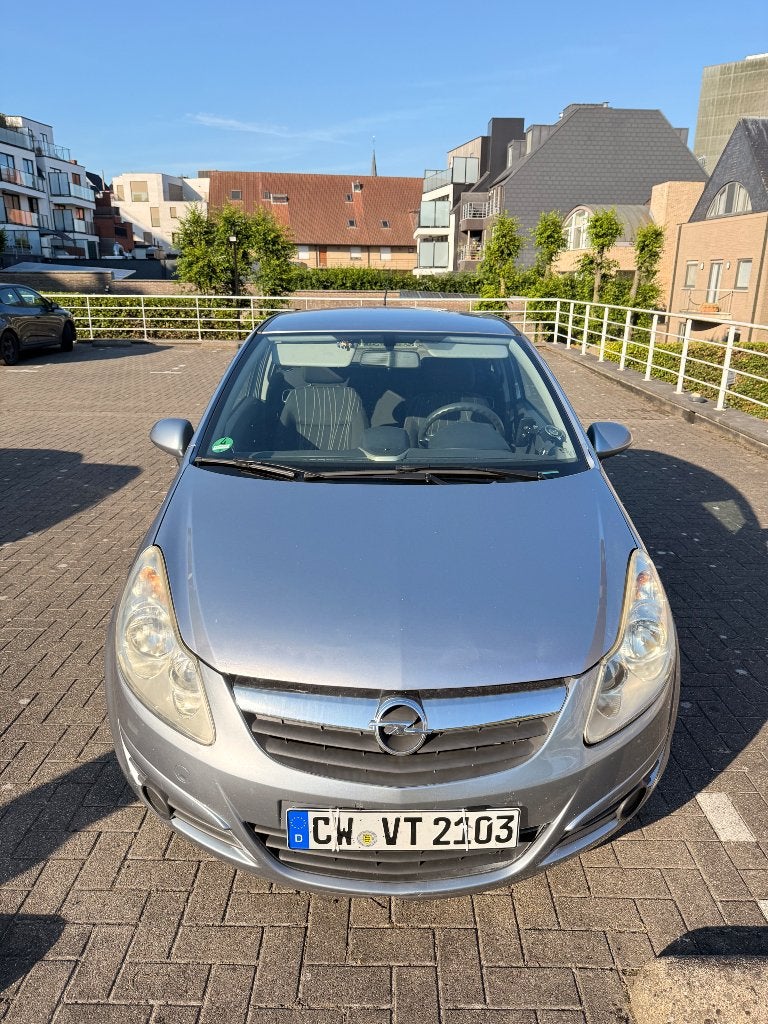 Opel Corsa 1.2 Benzine 2008, Auto's, Voorwielaandrijving, Stof, Zwart, 4 cilinders