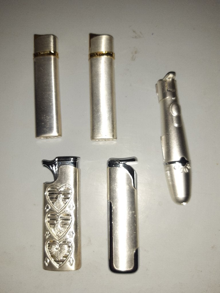 5 briquet design à recharger, Ophalen of Verzenden, Nieuw, Aansteker