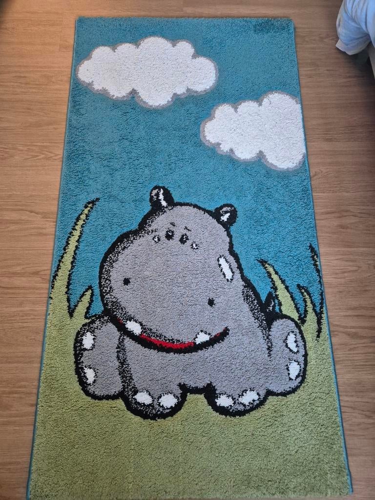 Kindermat met neushoorn, Ophalen