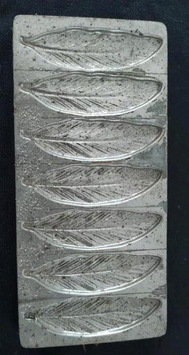 Oude metalen Pralinevormen, Ophalen