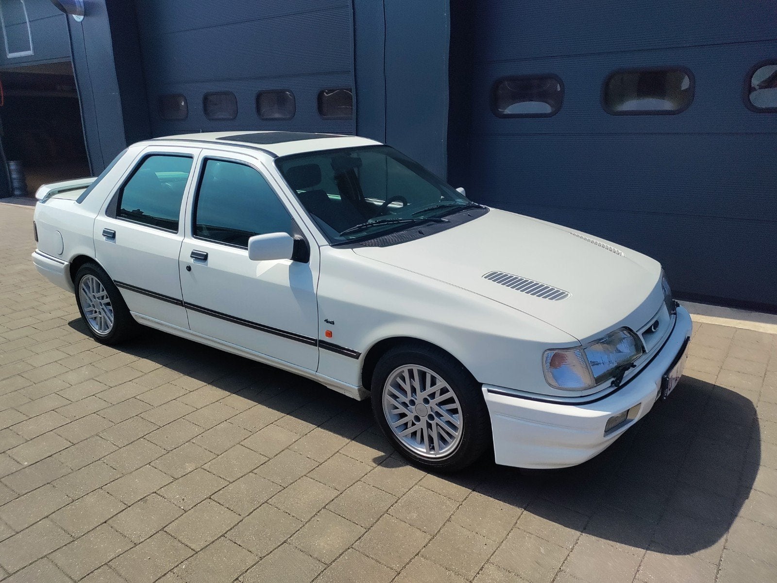 Ford Sierra Cosworth 4x4 1991, Auto's, Ford, 4 deurs, Zwart, Wit, Leder