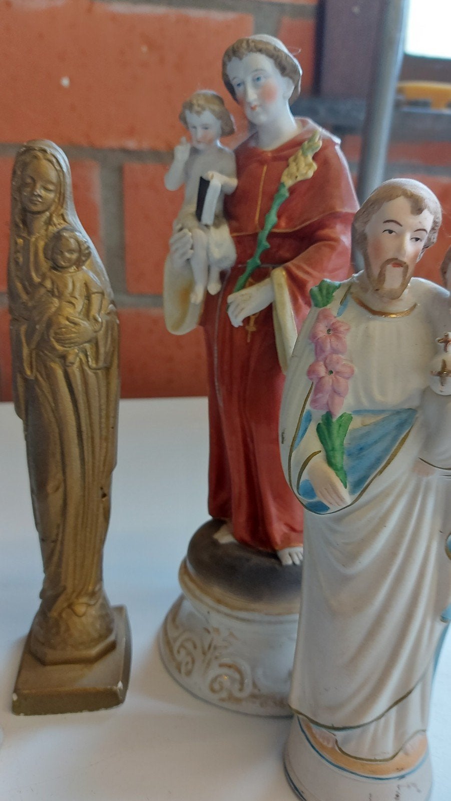 5 heiligen beeldjes, Ophalen