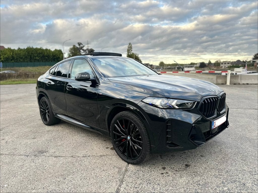 BMW X6 xDrive 40M SportPro 2024, Auto's, Automaat, 2240 kg, Euro 6, Zwart