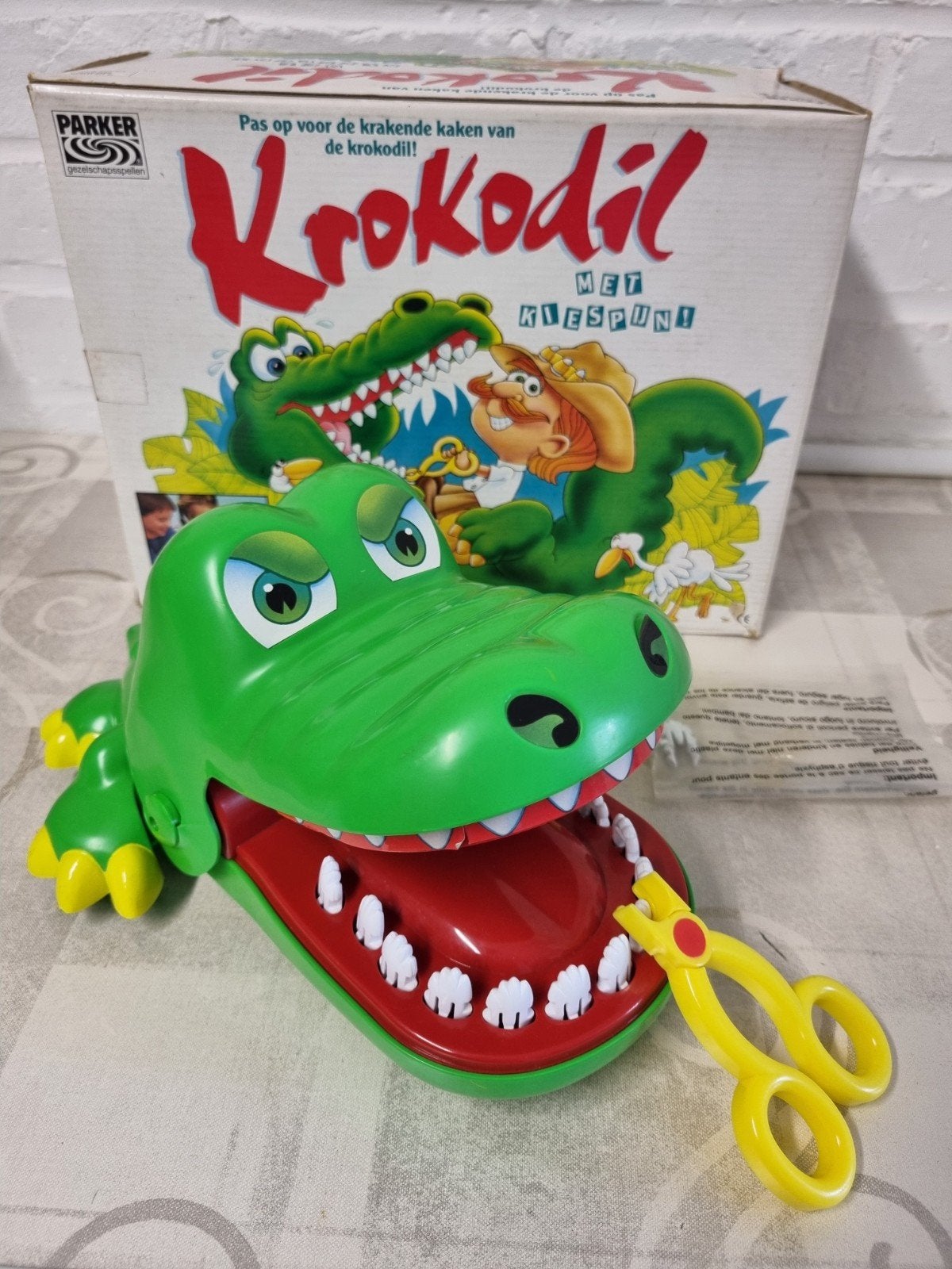 Krokodil met kiespijn, Ophalen