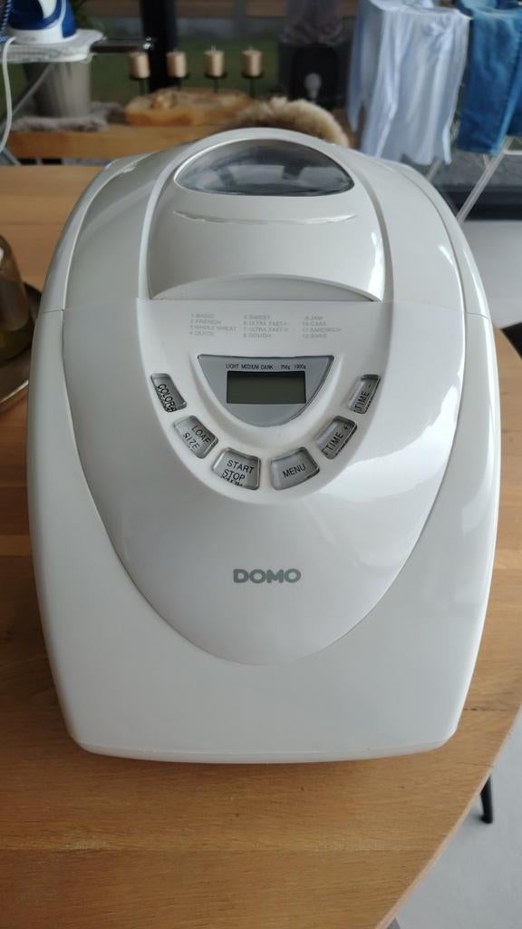 Domo broodmachine, Ophalen