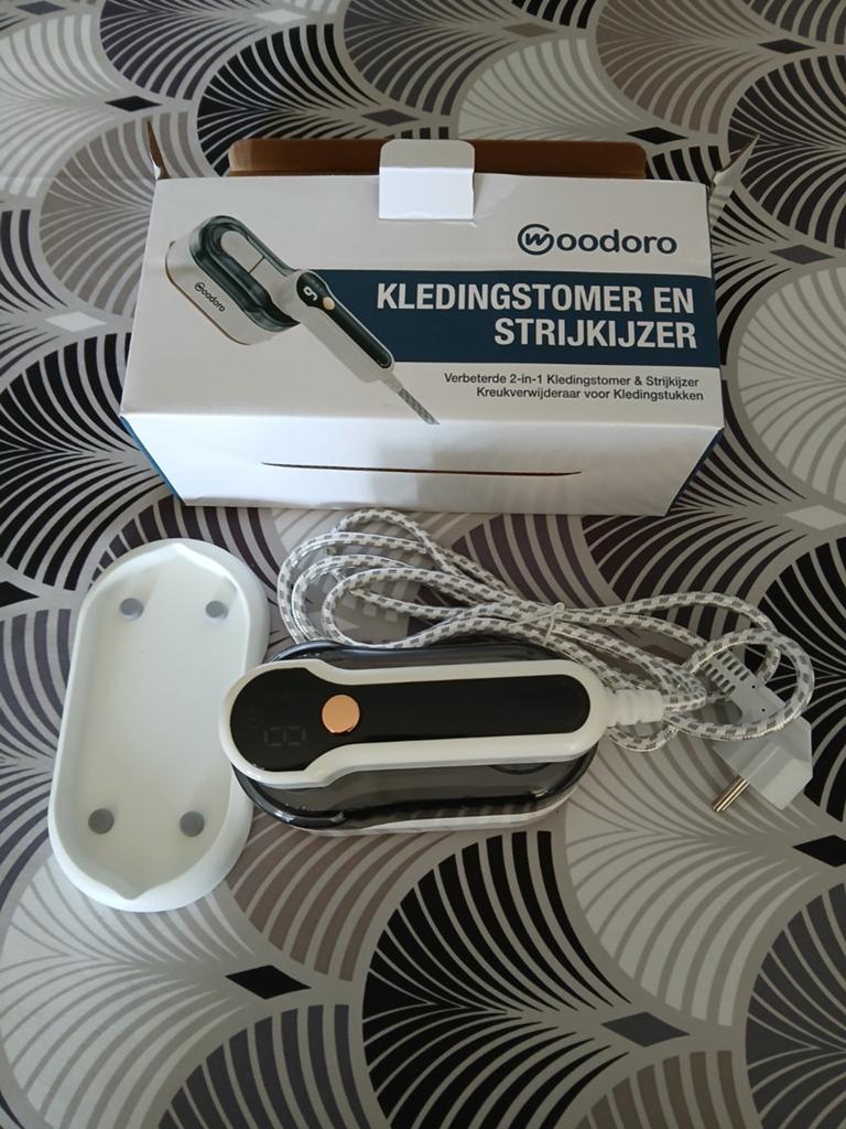 Kledingstoffen en strijkijzer, Ophalen