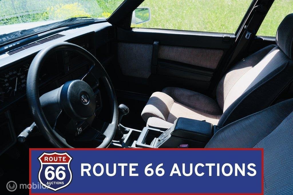 Alfa Romeo 75 | 1986 | Route 66 Auctions, Autos, Achat, Entreprise, Boîte manuelle, Autre carrosserie
