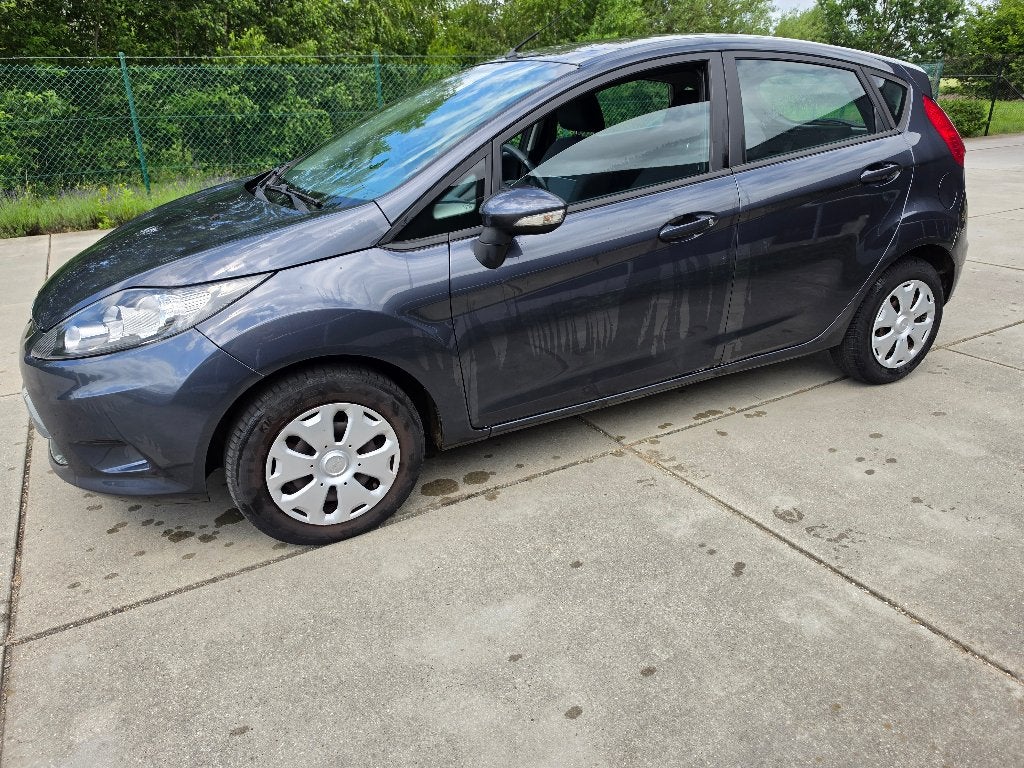 Ford Fiesta 1.2i 5 Deurs Airco Gekeurd + Garantie, Elektrische ramen, Bedrijf, Euro 4, Zilver of Grijs