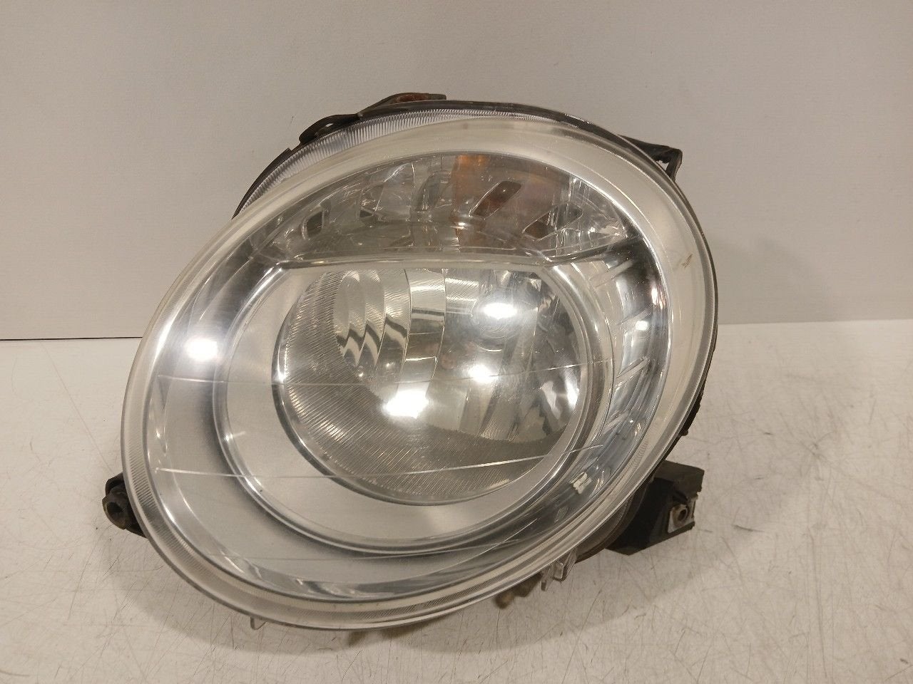 Koplamp links Fiat 500, Van der Ven Autorecycling B.V., Gebruikt, Ettenseweg 76, 4706 PB Roosendaal, The Netherlands, Herkomst onderdeel bekend