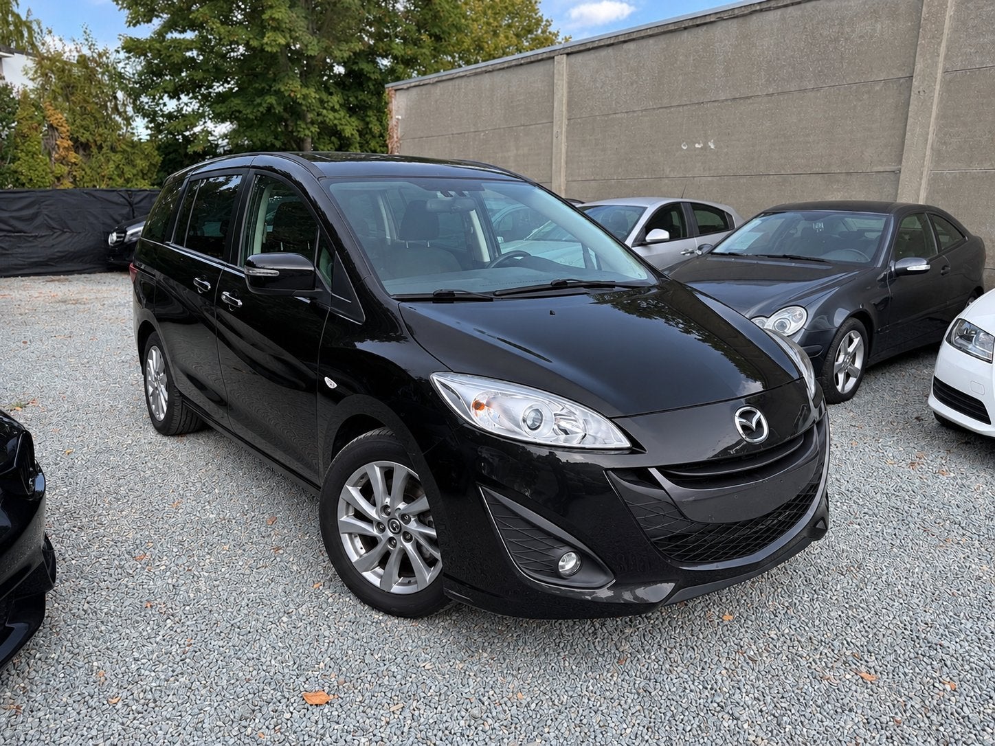 Mazda 5 benzine 7 zitplaatsen garantie, keuring, Auto's, Euro 5, Monovolume, Zwart, 4 cilinders