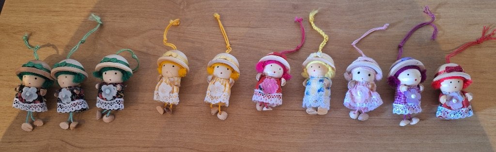 Set van 10 kleurrijke houten (geluks)poppetjes, Ophalen of Verzenden, Zo goed als nieuw