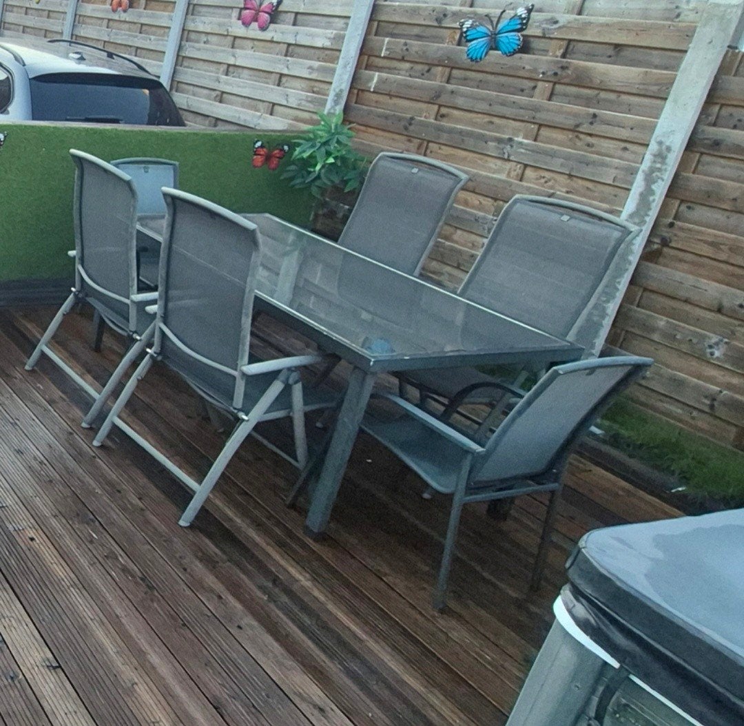 tafel met glazen blad + 6 stoelen + kussens, Ophalen