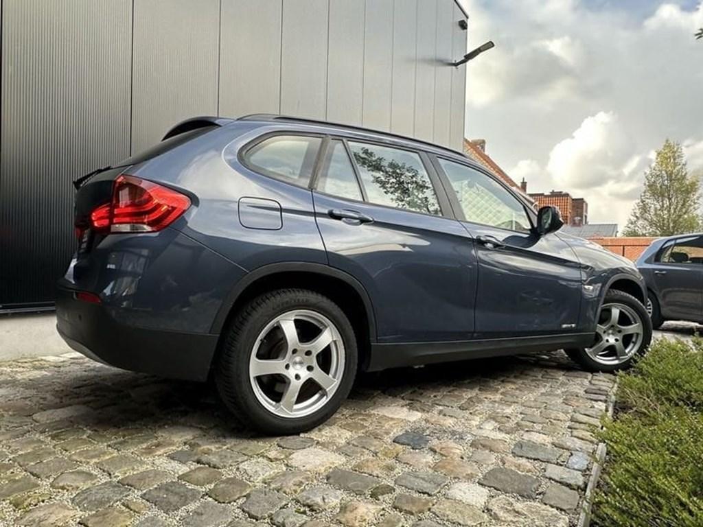BMW X1 sDrive18i AUT/Apple carplay/Navi/XENON/PDV v+a/Garan, Euro 5, Zwart, Blauw, https://public.car-pass.be/vhr/c46ac65a-5692-4a02-a9f2-ef3cf85c6101