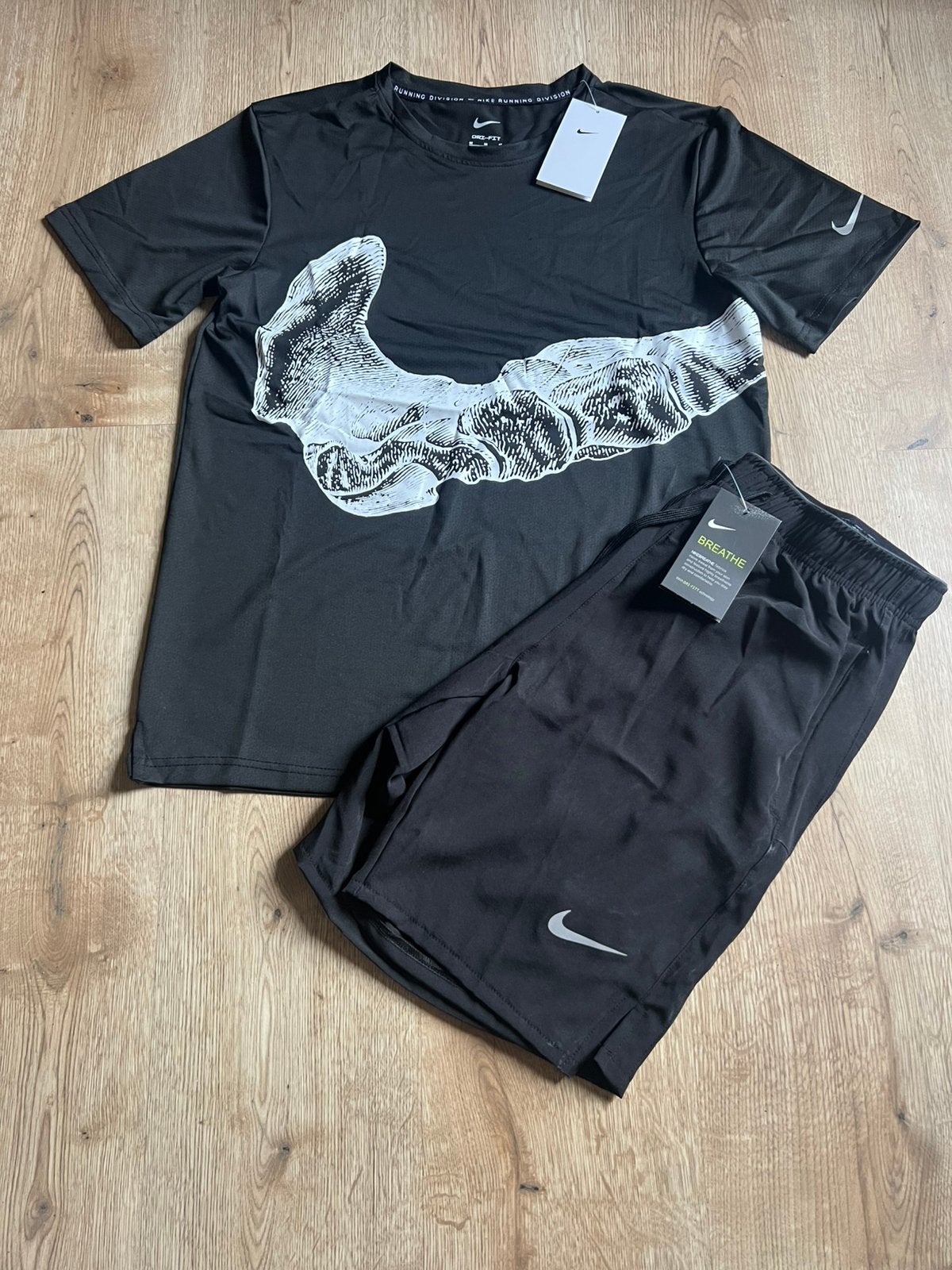 Nike Running Division skeletenset, Ophalen of Verzenden, Nieuw, Maat 48/50 (M)