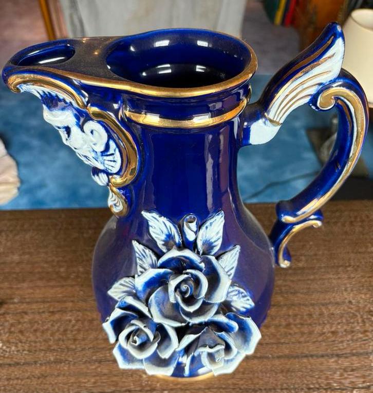 Joli vase/carafe, Enlèvement