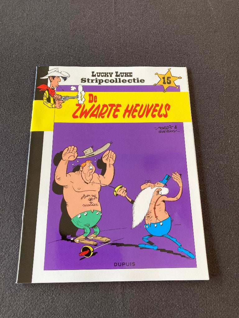 Strip 'De zwarte heuvels' Morris & Goscinny, 1x gelezen, Boeken, Eén stripboek, Ophalen of Verzenden, Zo goed als nieuw, Morris & Goscinny,