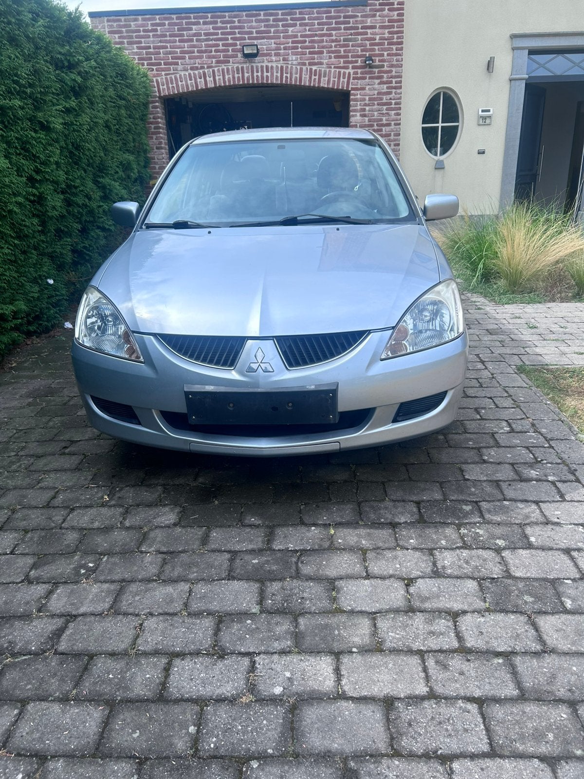Mitsubishi Lancer 1.6 benzine, bouwjaar 2005, met 175.567 km, Auto's, Mitsubishi, Voorwielaandrijving, Dealer onderhouden, Stof