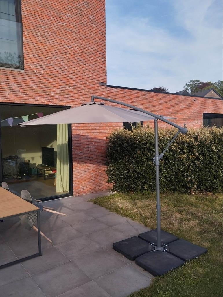 Parasol met voet, Ophalen