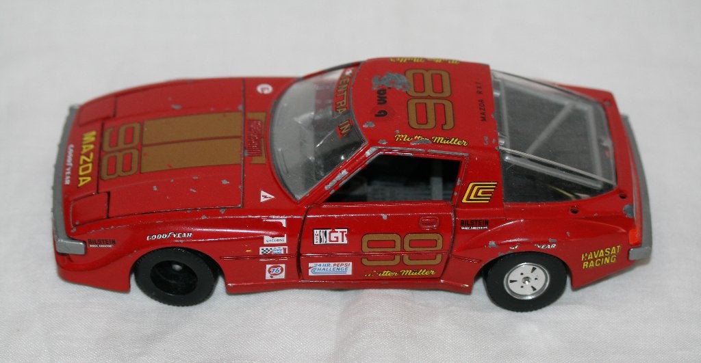 Mazda RX-7 1/24 Burago Italy modelauto, Ophalen of Verzenden, Gebruikt, Auto, Burago
