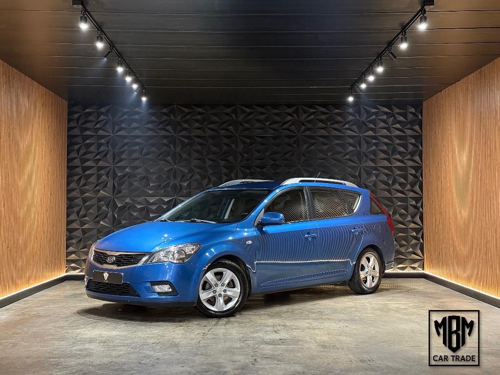 ✅ Kia Cee'd SW 1.4i GARANTIE Airco Parksensoren 1.Eigenaar, Auto's, Kia, Bedrijf, Te koop, (Pro) Cee d, ABS, Airbags, Airconditioning