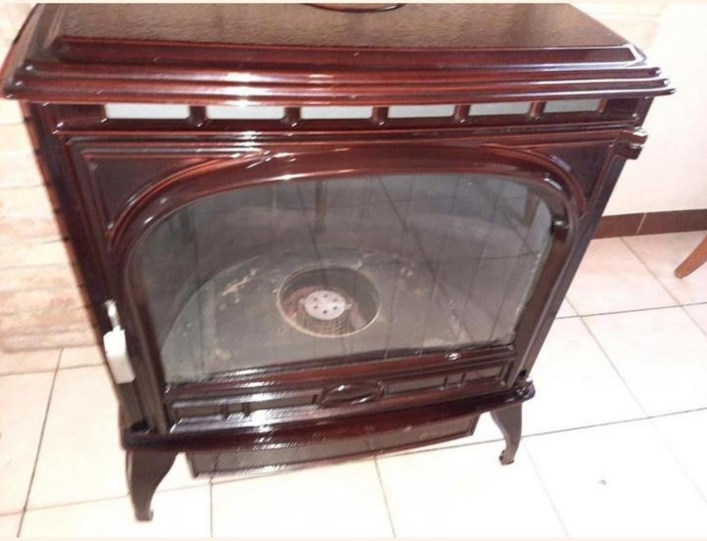 Poêle mazout en fonte émaillée, Enlèvement