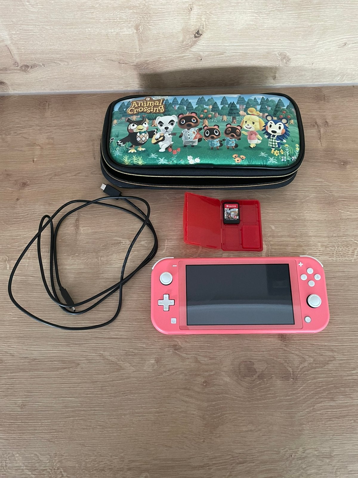 Nintendo Switch Lite rose clair + RollerCoaster Tycoon, Enlèvement, Rose ou Corail, Comme neuf, Avec housse de protection ou sac