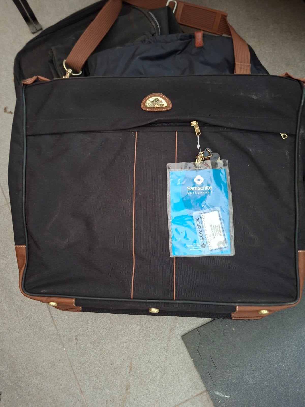 sac porte costume/ housse Samsonite, Enlèvement