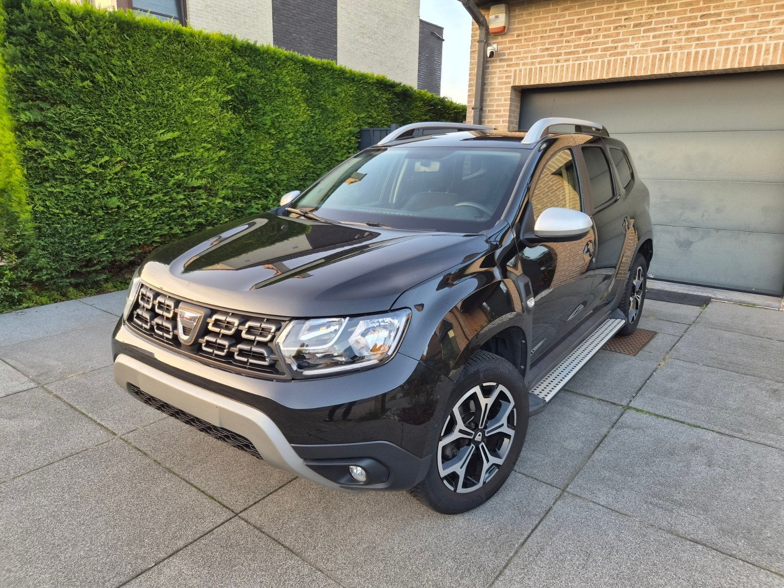 Dacia Duster 1.3 TCe Rainbow * CRUISE / CAMERA / NAVI *, Auto's, Euro 6, Duster, Zwart, Verwarmde buitenspiegels