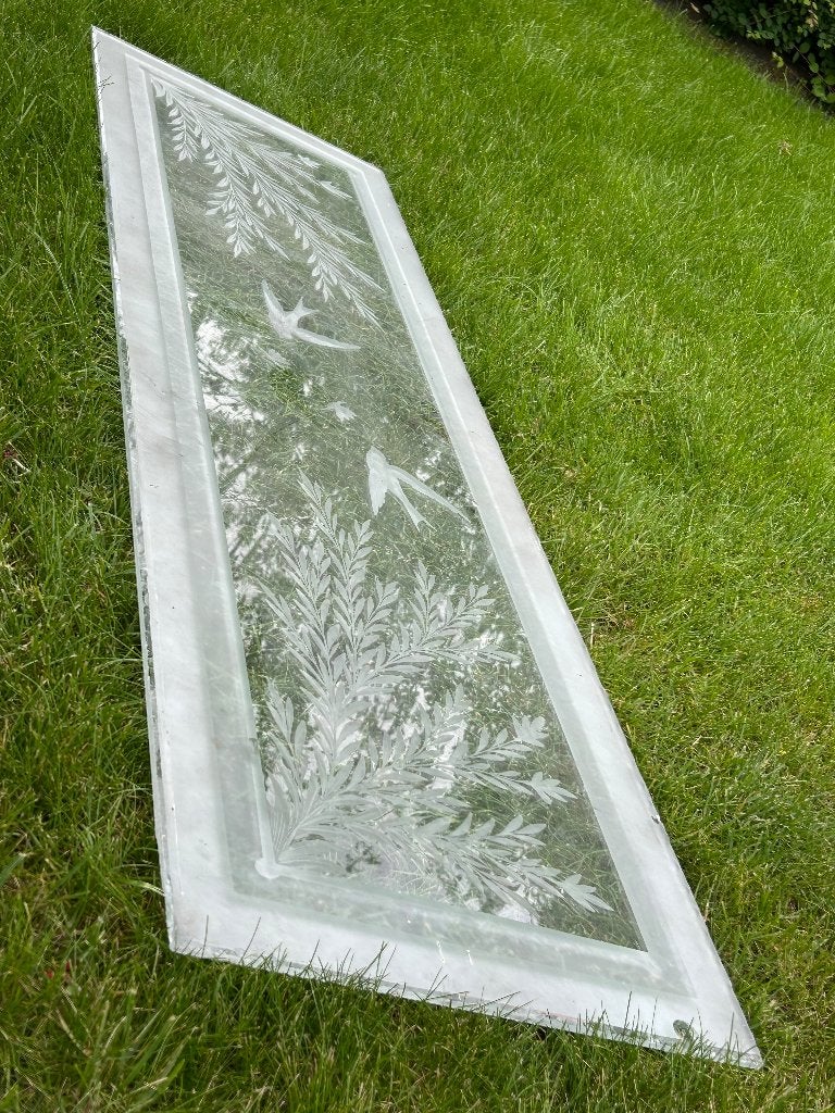 Geëtst glas bovenlicht, Ophalen