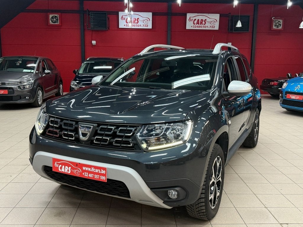 Duster 1.3 TCe 4WD Prestige**NAVIGATIE**CAMERA**4x4**, Auto's, Stof, 4 cilinders, Duster, https://public.car-pass.be/vhr/b56d4ae7-387d-4759-b218-155b7709852a