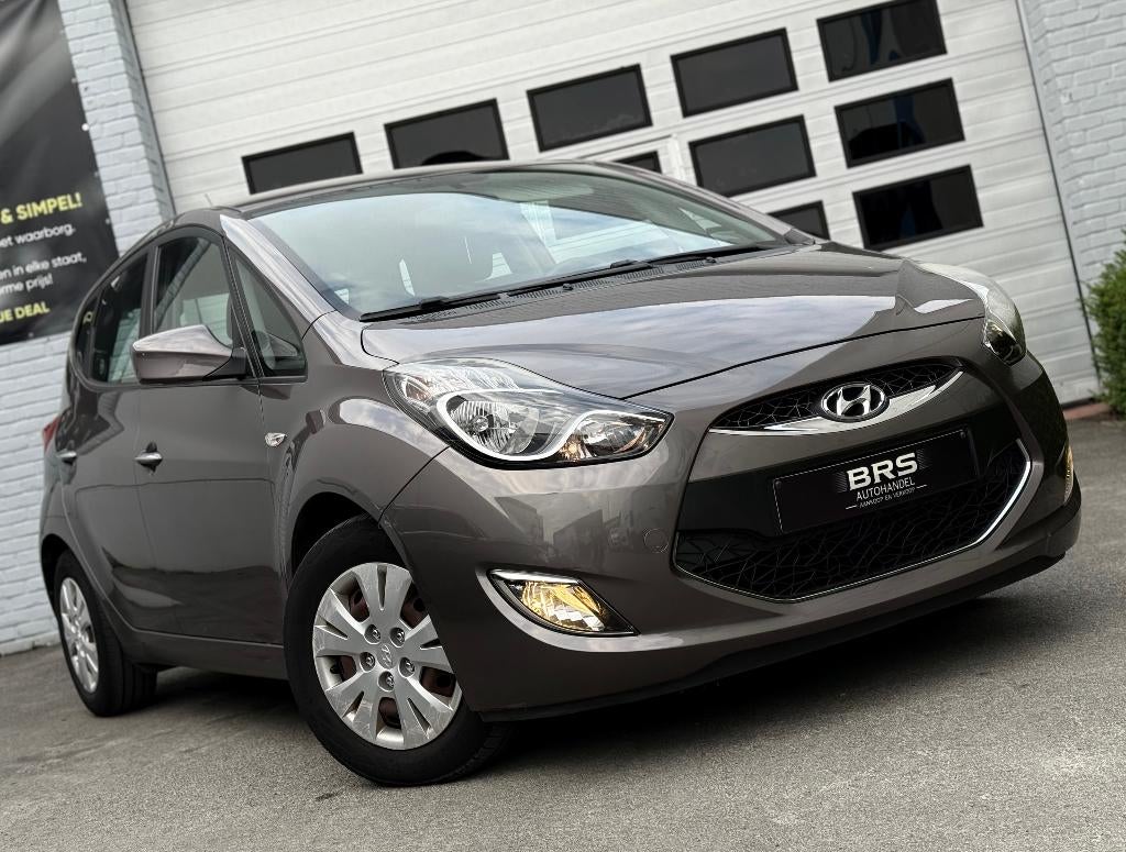 Hyundai IX20 1.6 Benzine Automatiek 2012 Met Garantie., Euro 5, 4 cilinders, Bruin, Bedrijf