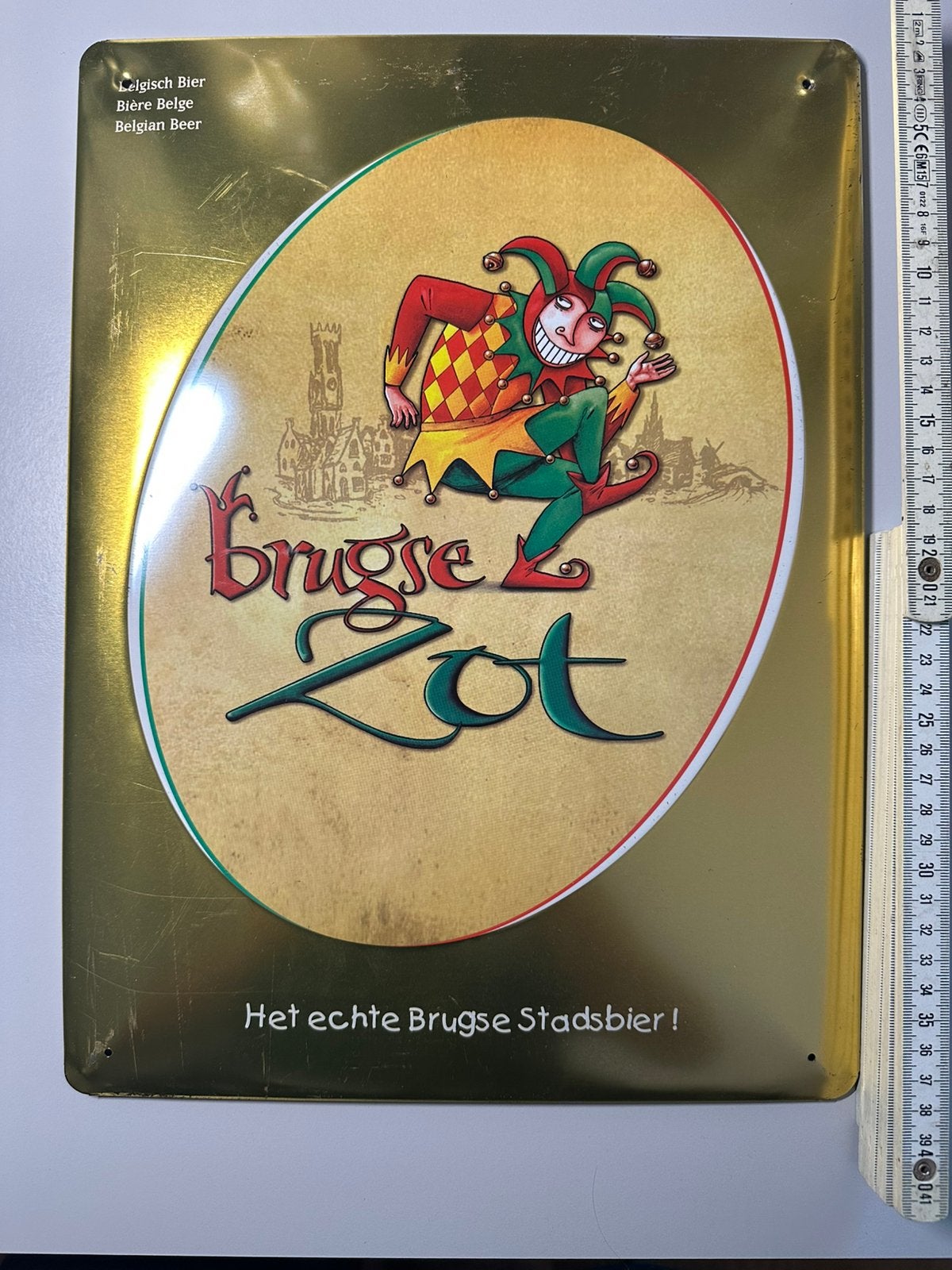 Metalen bord Brugse zot, Enlèvement ou Envoi, Comme neuf