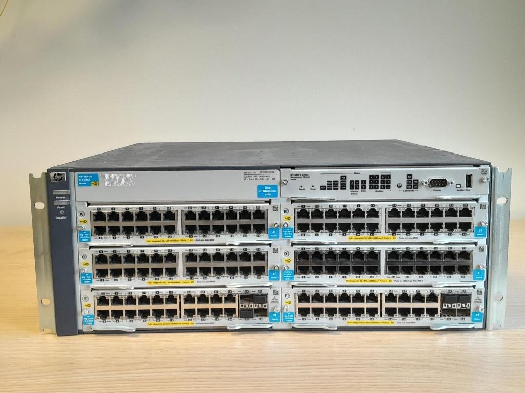 .HP ProCurve E5406 Switch, met 6 modules, Computers en Software, Netwerk switches, Ophalen of Verzenden, Gebruikt
