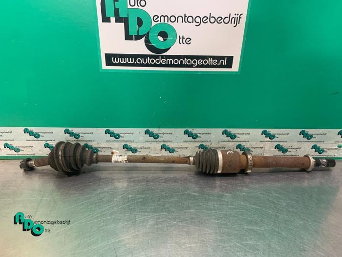 Arbre de transmission avant droit d'un Renault Clio (Clio 3, Renault, -, 3 mois de garantie, Utilisé
