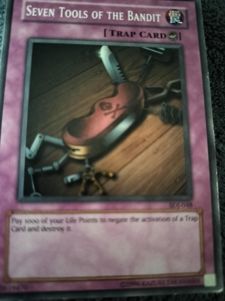 Yu-Gi-Oh kaart Seven Tools Of The Bandit, Ophalen